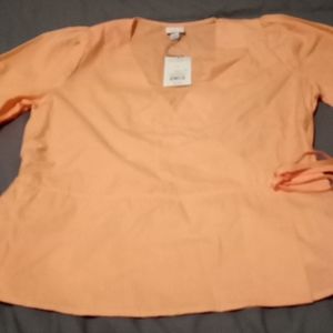 A blouse with a side tie peach